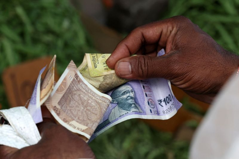 Rupee falls past 92/dollar to record low on Mideast war, central bank likely steps in<br>