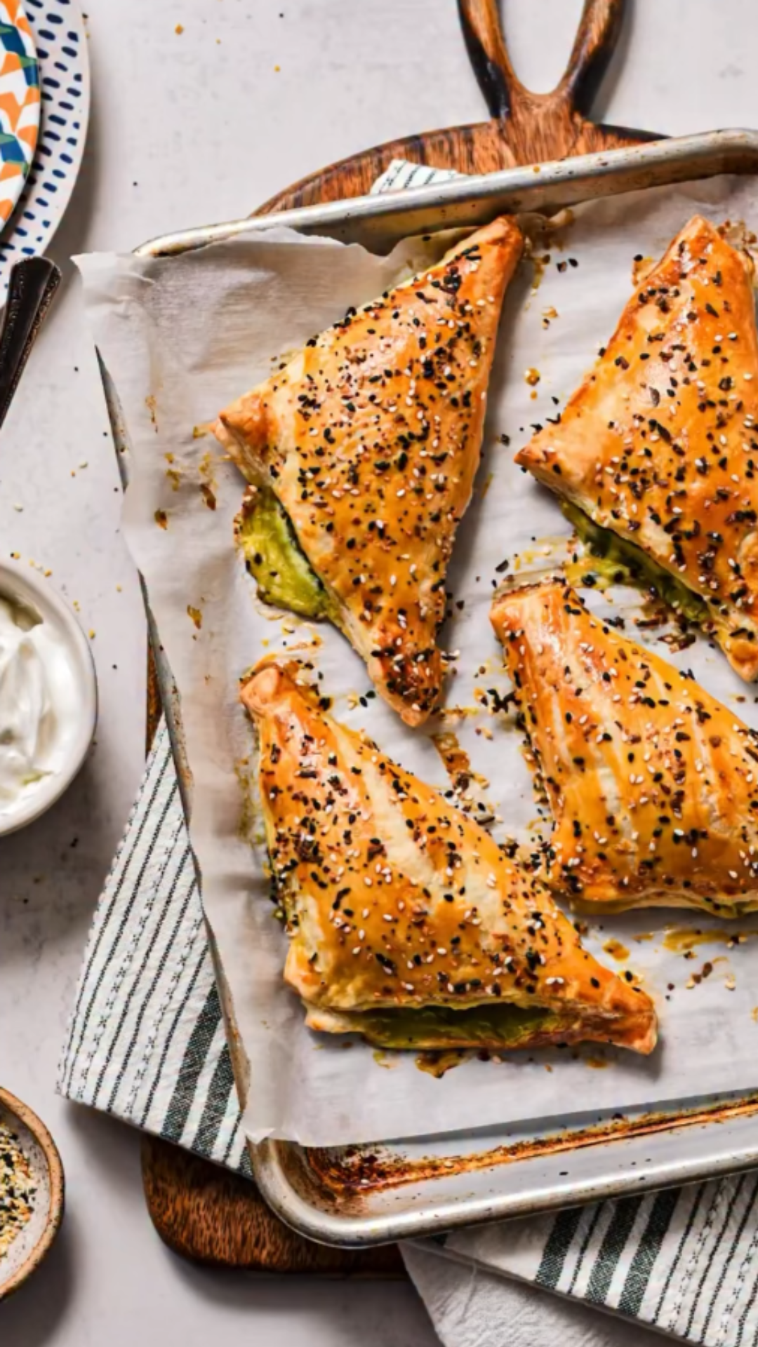 These golden spanakopita turnovers turn a classic Greek pie into ...