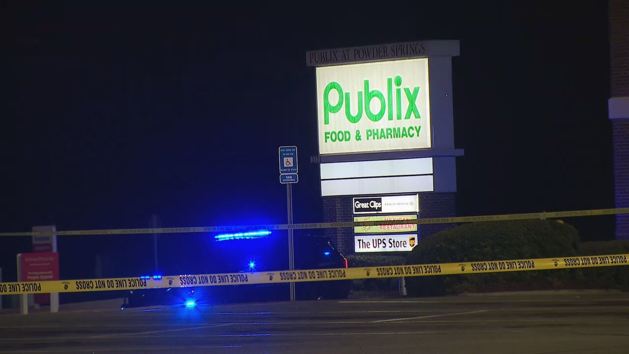 Man shot, killed by officers in Publix shopping center parking lot