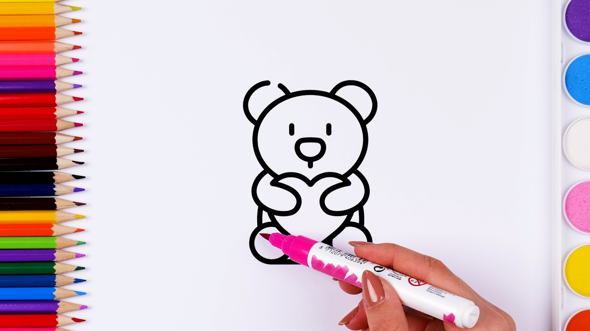 Coloring a drawing of a teddy bear