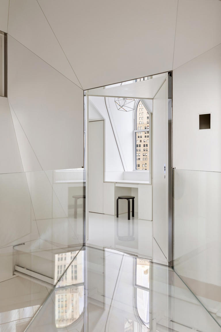 Inside a $20M NYC penthouse with a rope swing, a rock-climbing wall ...