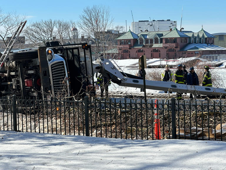 Person taken to hospital after bucket truck crash in Cambridge