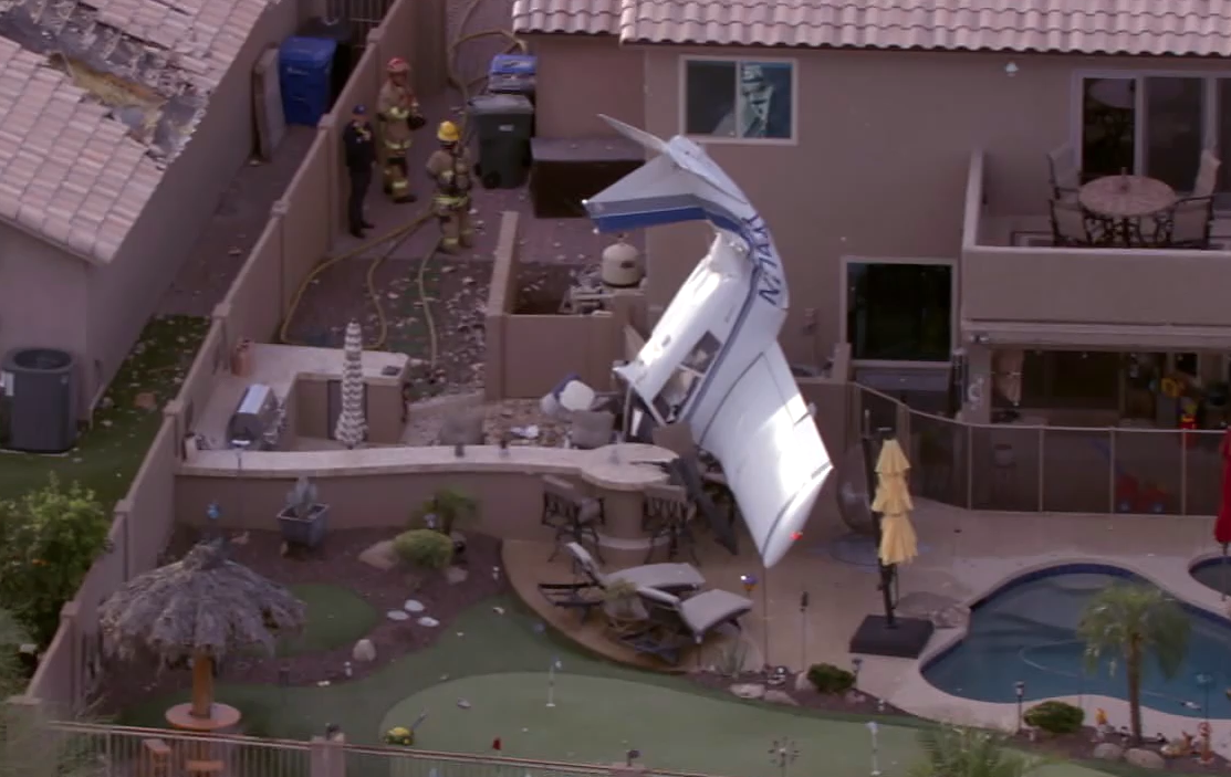 Small plane crashes into Phoenix home, leaving three hurt