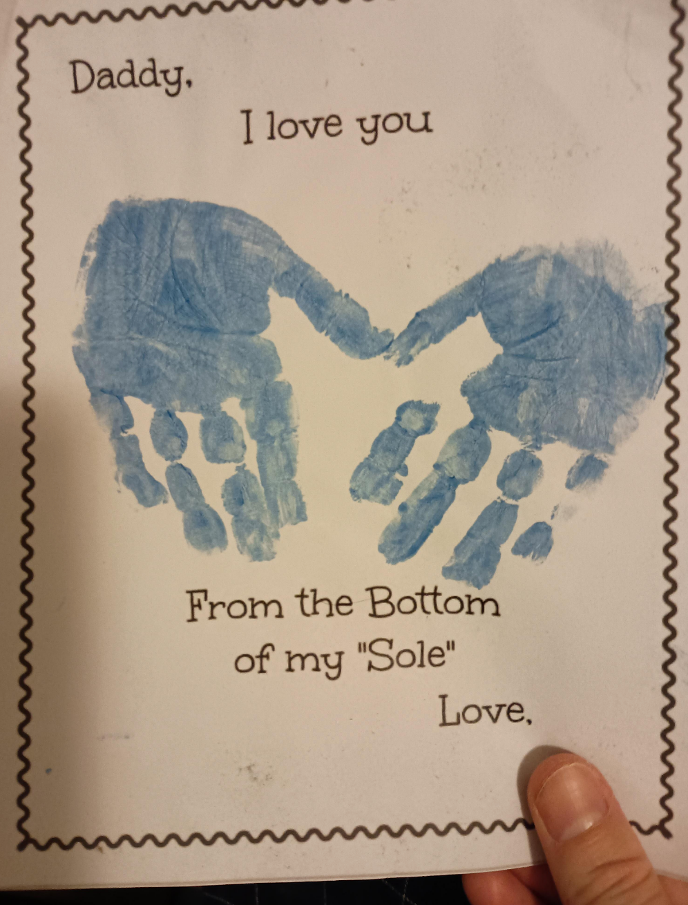 Card with handprint art reads: