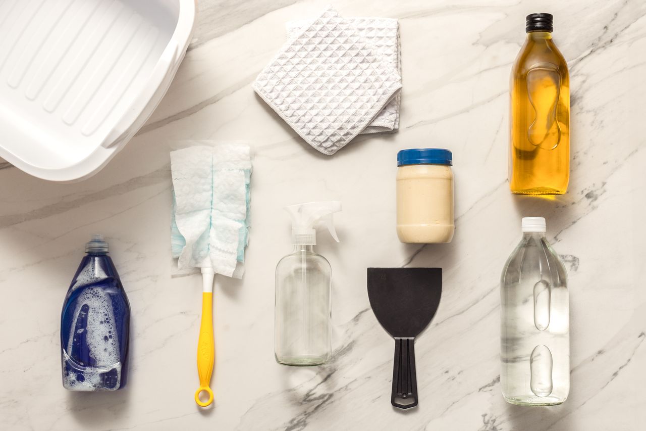 Materials and tools needed to clean wood cabinets