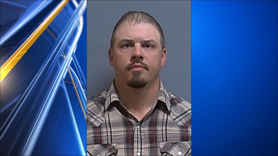 Kansas detention officer charged in child sexual abuse case