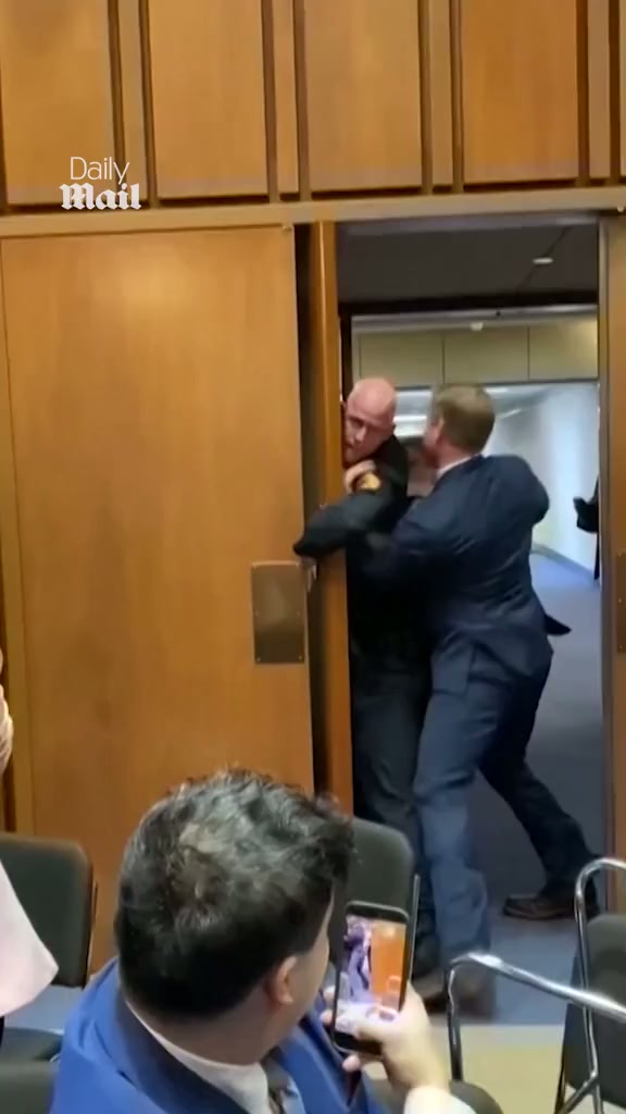 Moment senator joins Capitol Police to eject screaming Marine