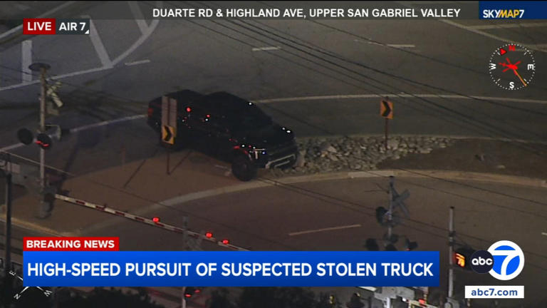 Driver in pickup truck crashes through fence during high-speed LA ...