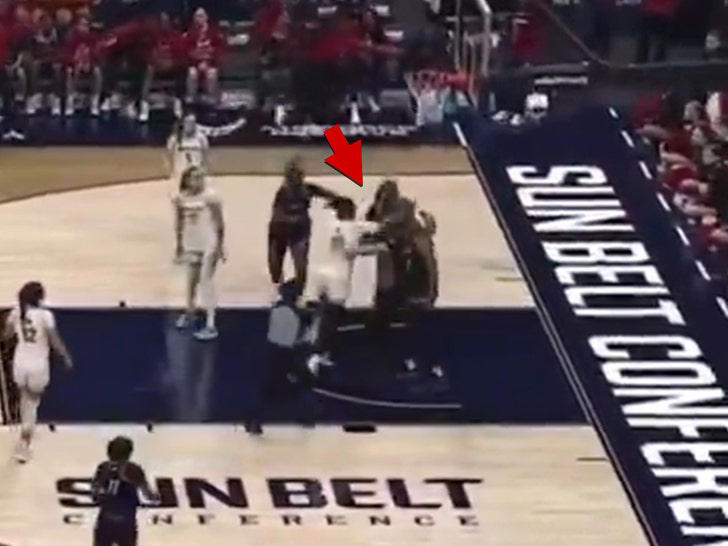 Referee leveled in massive college basketball brawl, 8 ejected