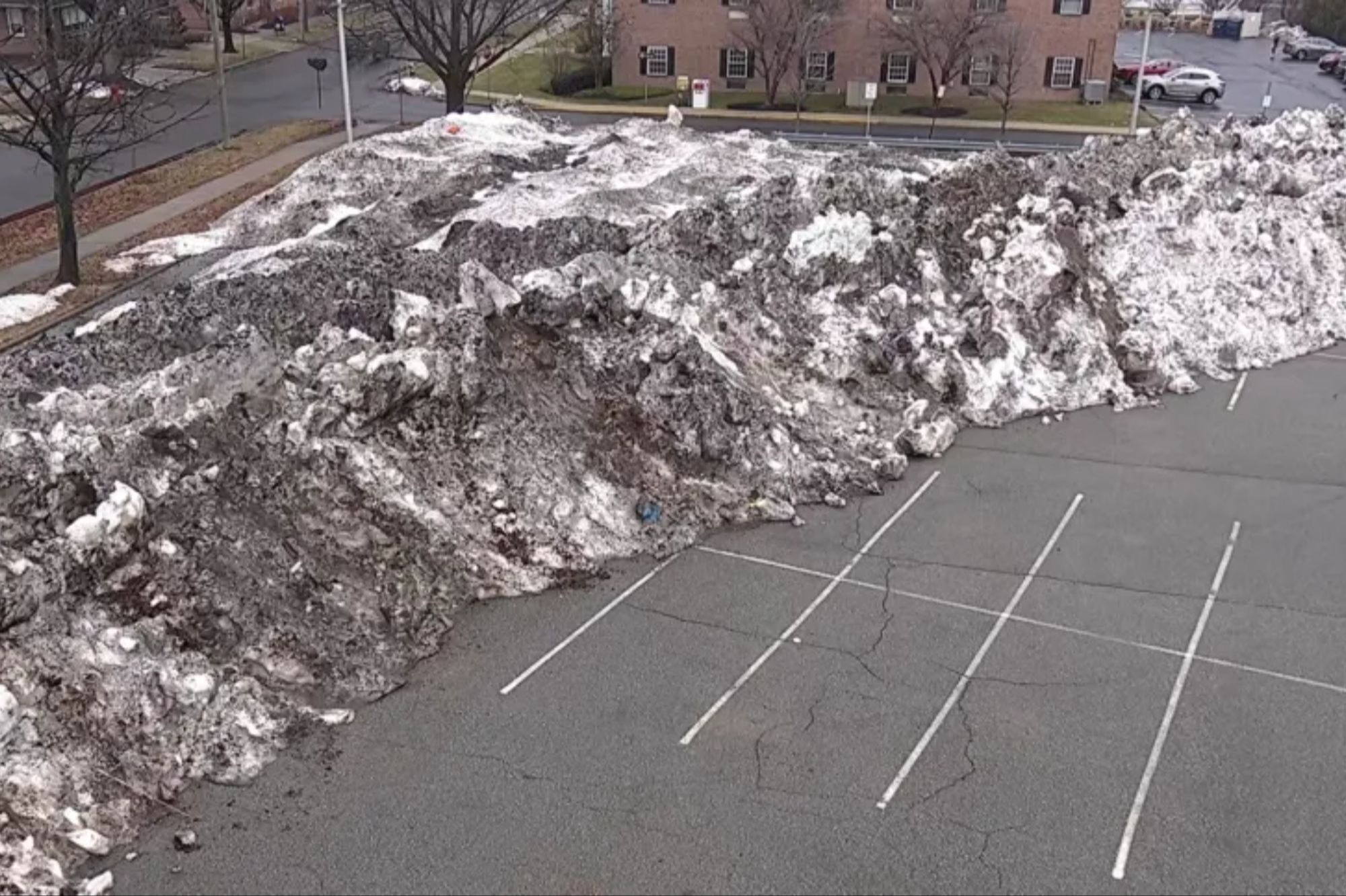 NJ rail line takes bets on when 'snow mountain' in station parking lot ...
