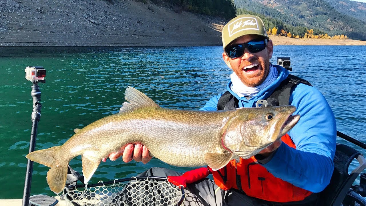 Kayak fishing for mackinaw lake trout and burbots in deep, icy waters