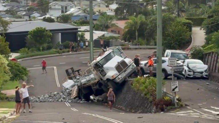 Out-of-control truck smashes into almost a dozen parked cars