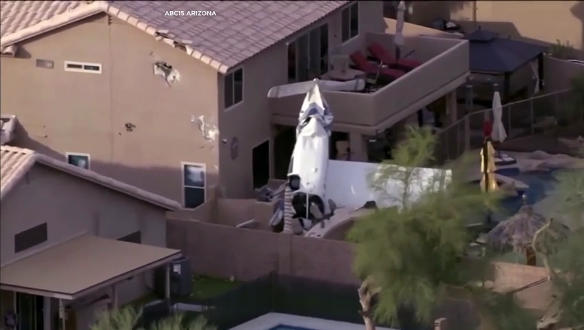 Small plane crashes into two homes in Phoenix, three injured