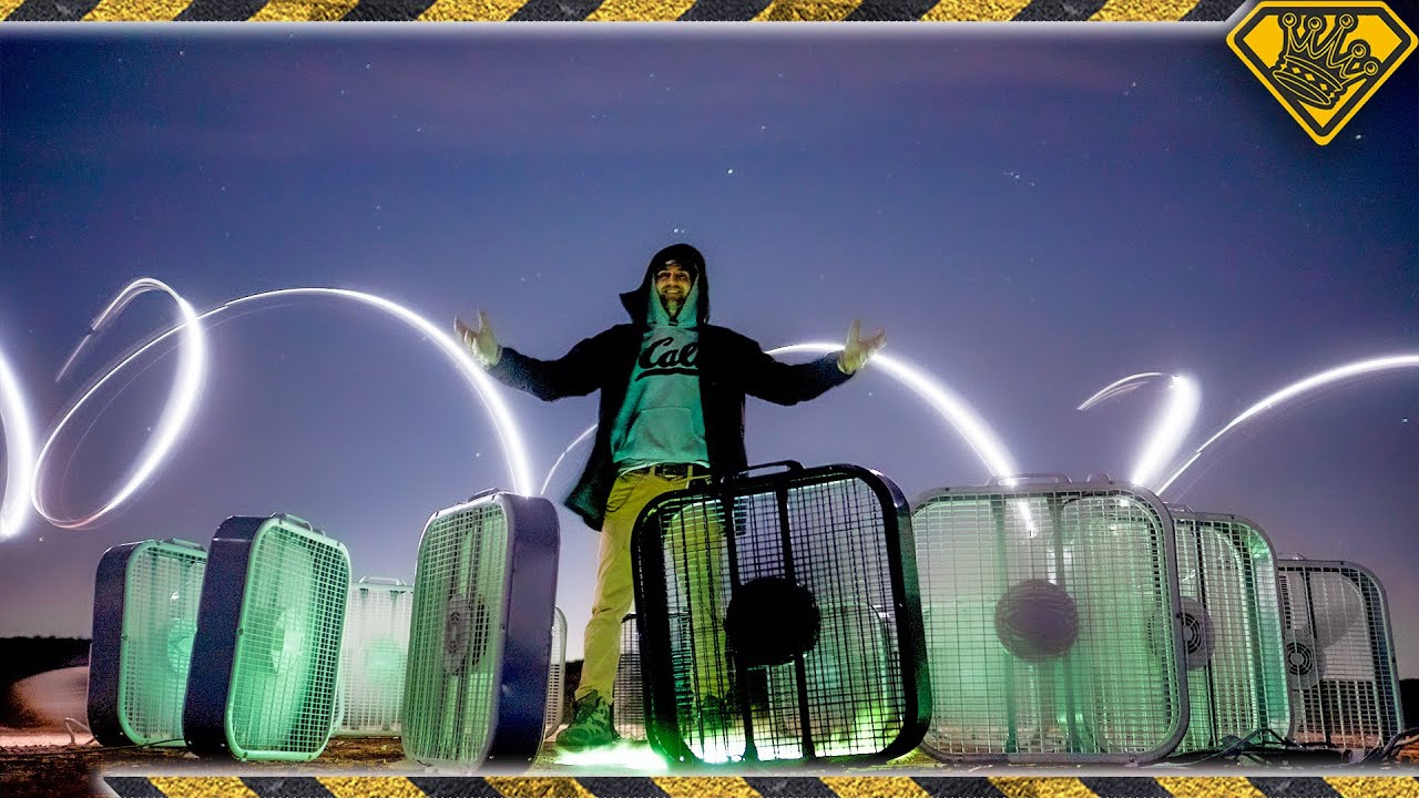 Witness the impossible glow of a massive green fire tornado
