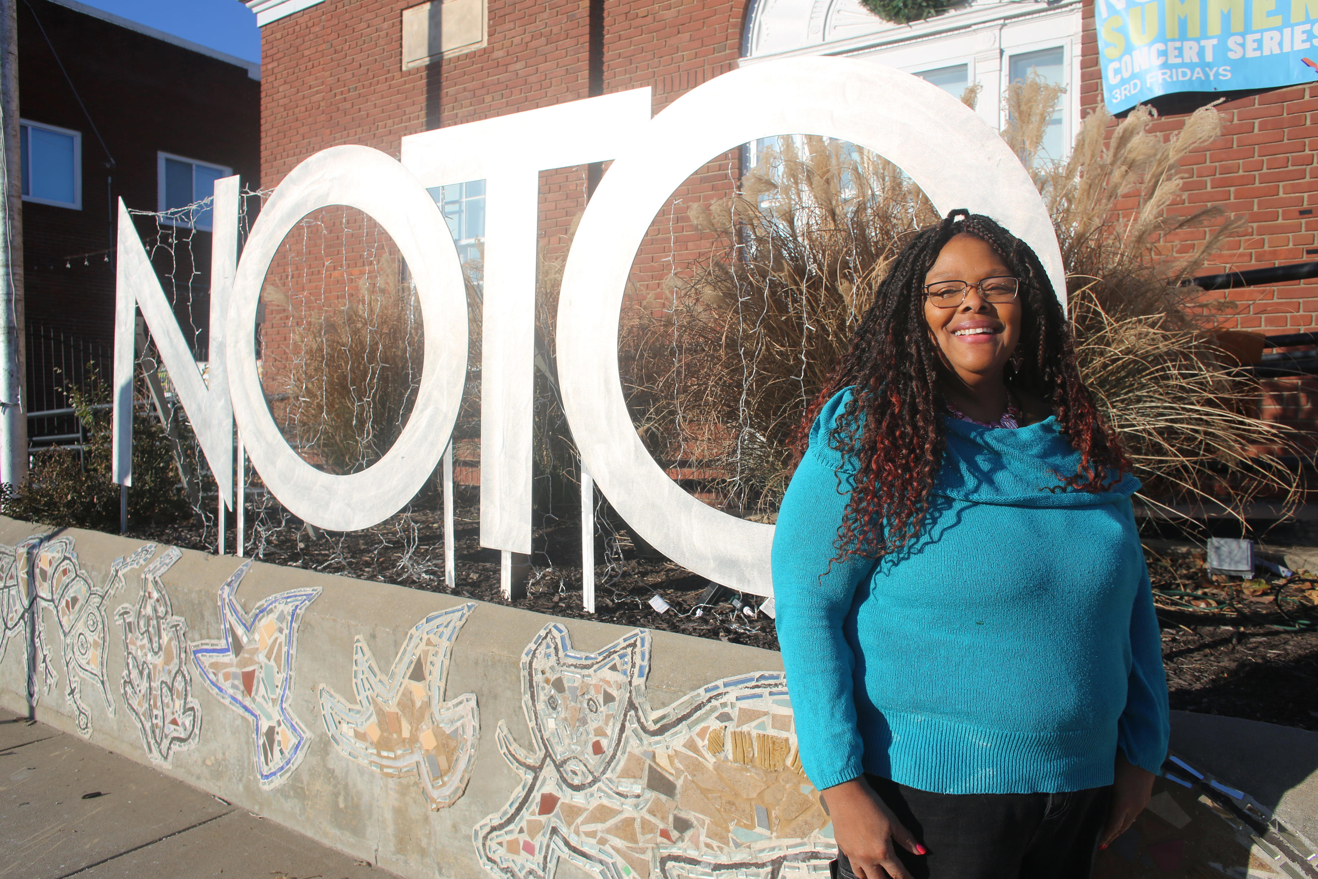 Event highlights historical mural being painted on bridge