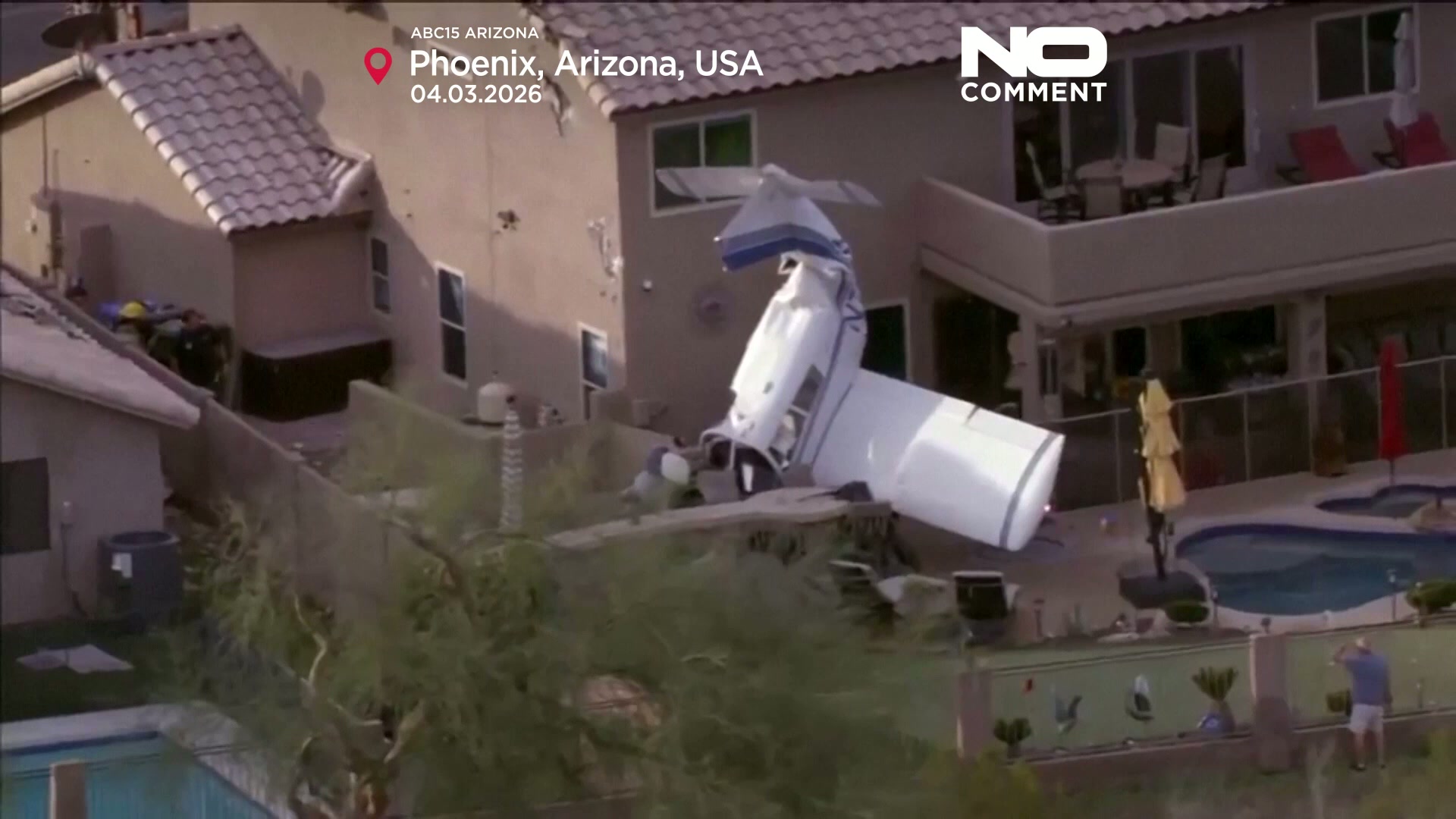 Small plane crashes into two homes in Phoenix, three injured