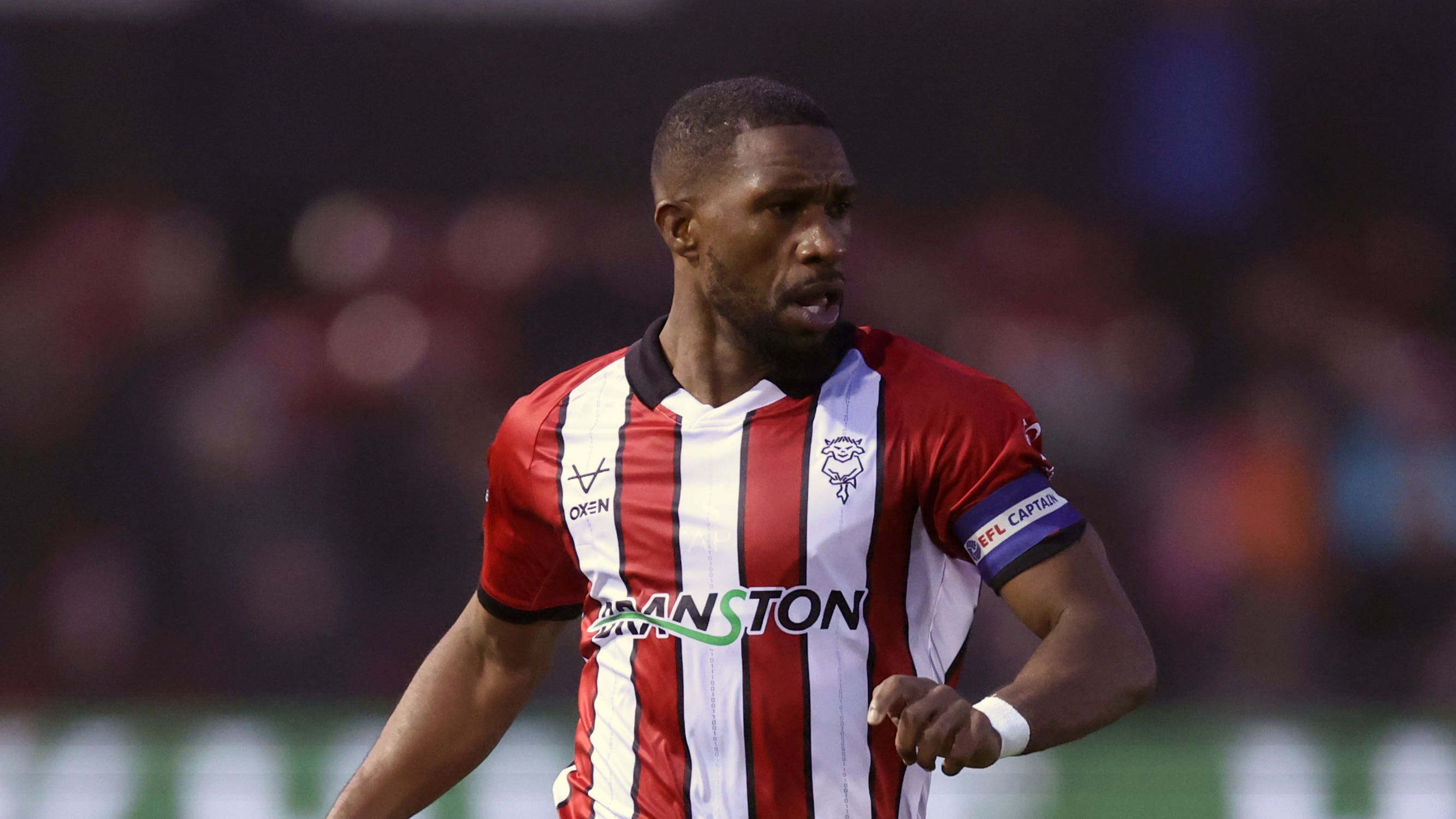 League One leaders Lincoln set record unbeaten streak with win over ...