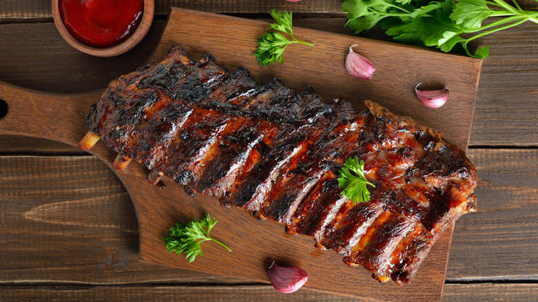 Alton Brown's trick for baby back ribs will make you look like a chef
