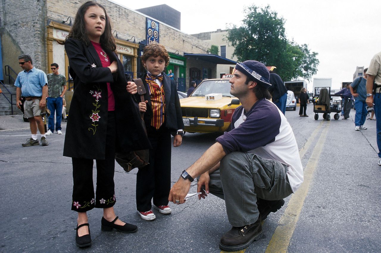 Alexa PenaVega, Daryl Sabara and Robert Rodriguez on 'Spy Kids' set Credit: Dimension Films / DR/Alamy