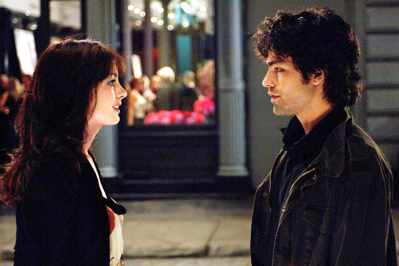 Anne Hathaway and Adrian Grenier in 'The Devil Wears Prada' Credit: Alamy
