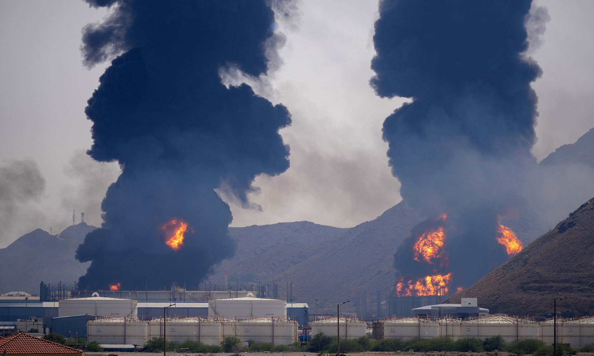 Iran strikes back at UAE oil depots as battle to control the Strait of ...