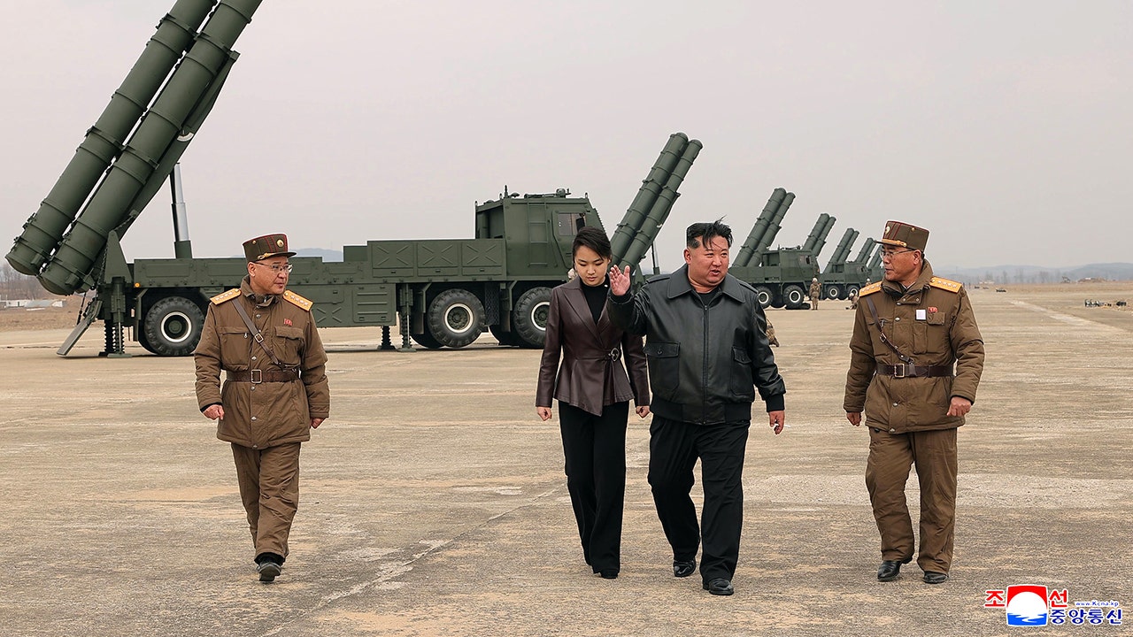 Kim Jong Un appears with teenage daughter at live-fire rocket test in North Korea<br>