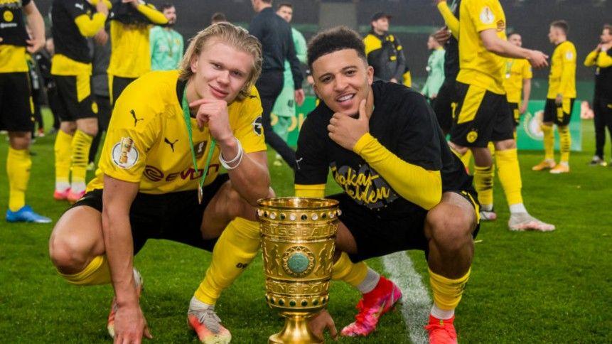 Erling Haaland and Jadon Sancho celebrate Dortmund's 2021 German Cup final win