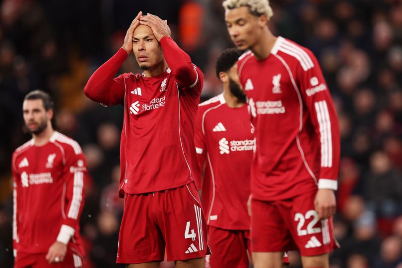 Virgil van Dijk of Liverpool looks dejected following the Premier League match between Liverpool and Tottenham Hotspur at Anfield on March 15, 2026 in Liverpool, England