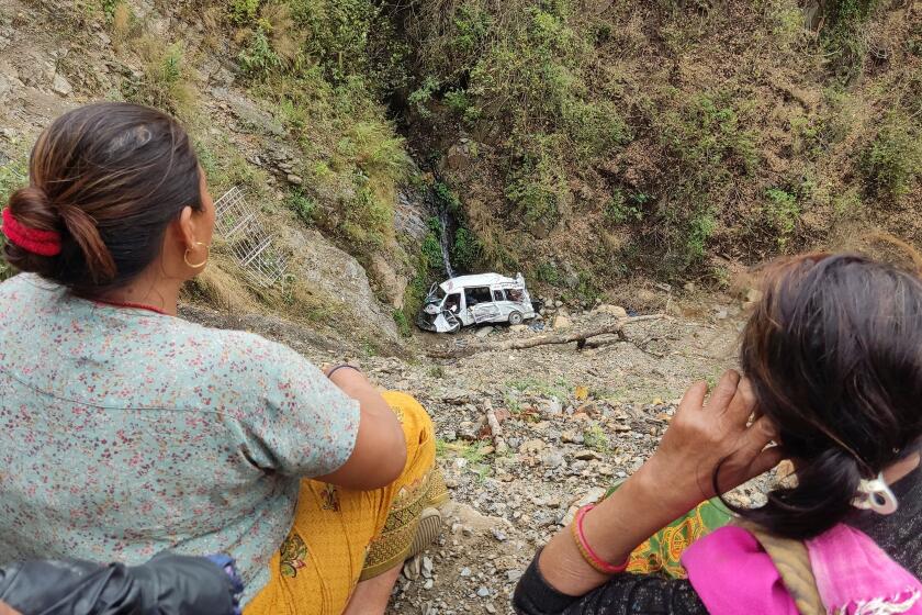 A bus carrying Indian pilgrims plunges off a mountain road in Nepal ...
