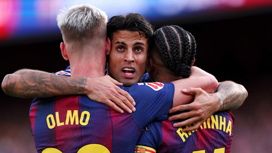 João Cancelo (middle) dominated. | David Ramirez/Soccrates/Getty Images