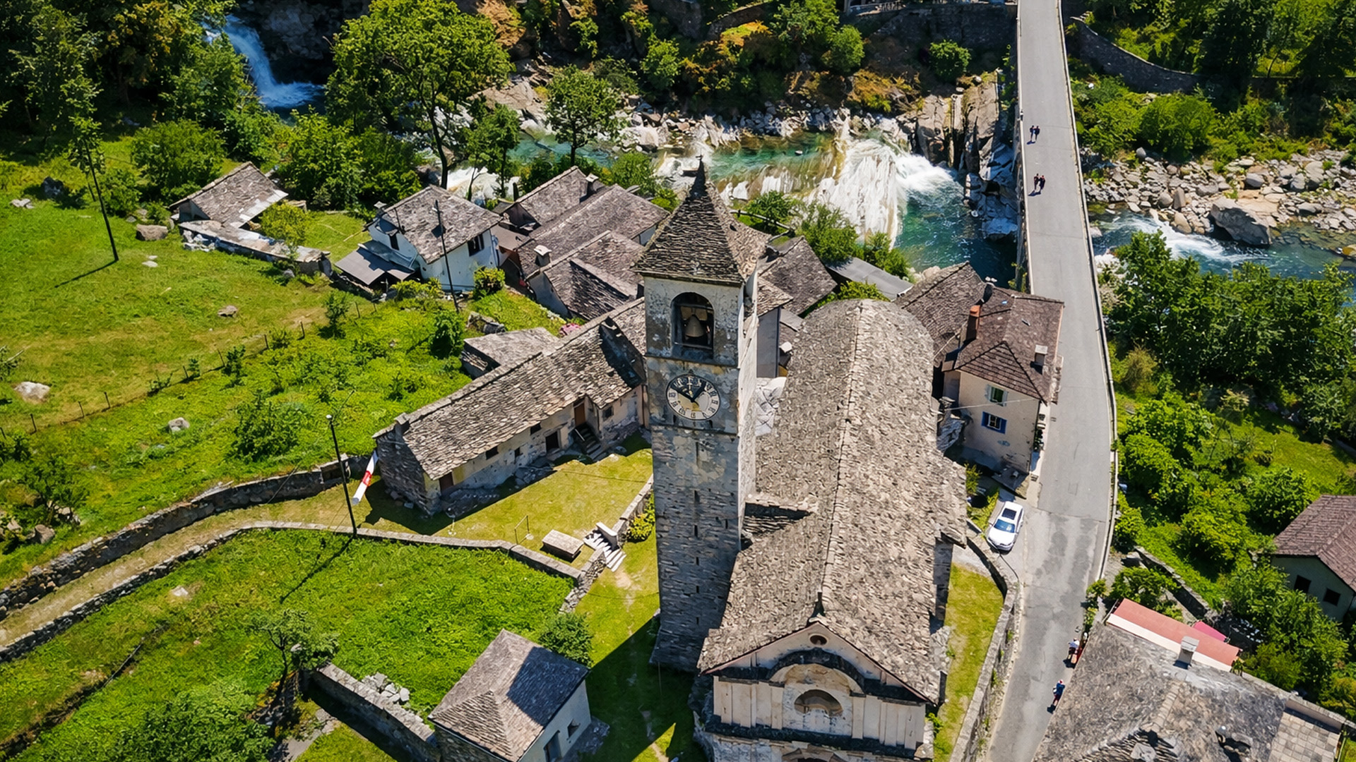 Why was this village built beside the river?