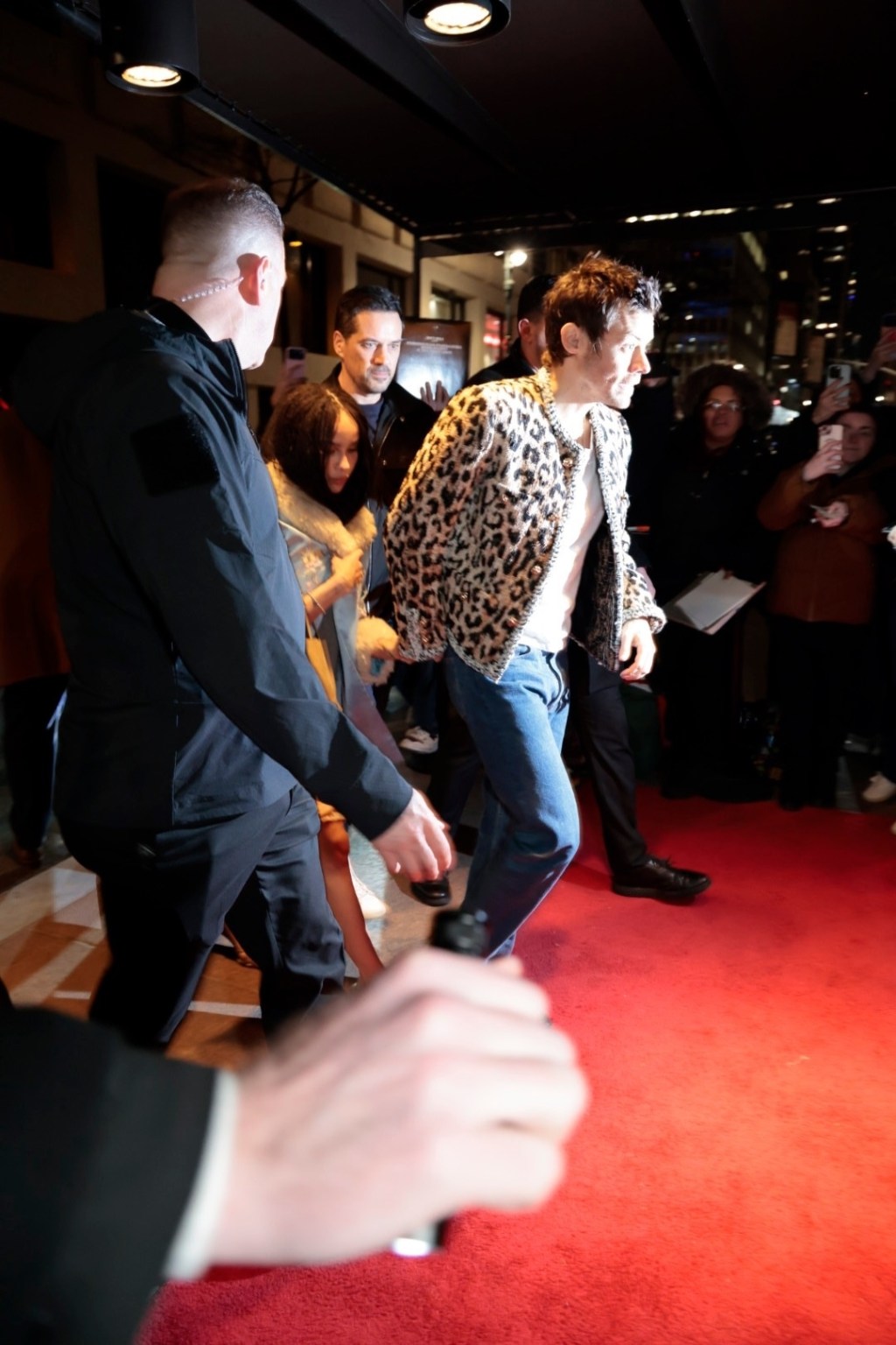 Harry Styles and Zoë Kravitz hold hands while arriving at 'SNL' afterparty