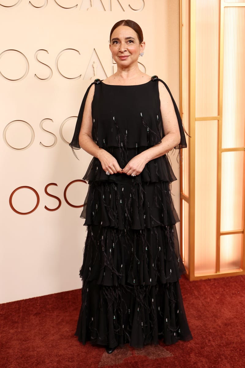 Maya Rudolph floats across the red carpet in Chanel