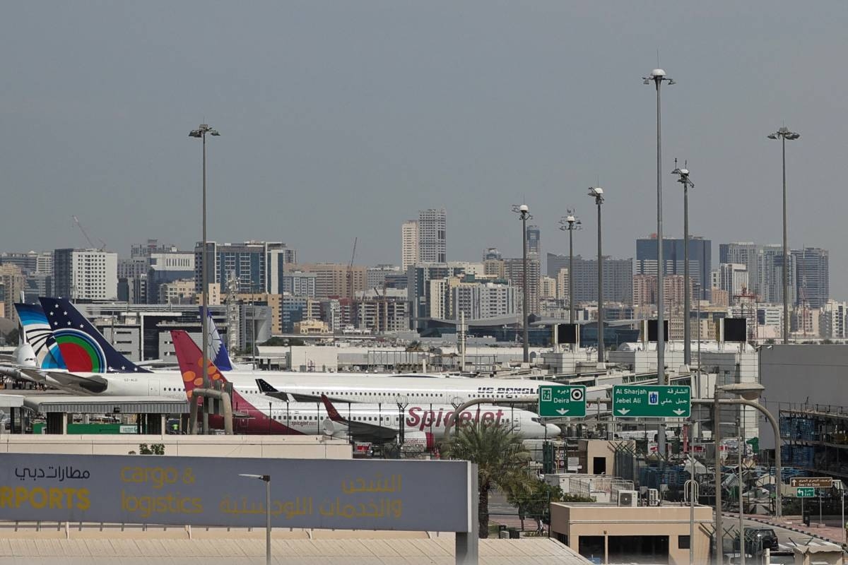 Flights temporarily suspended at Dubai's airport following nearby drone ...