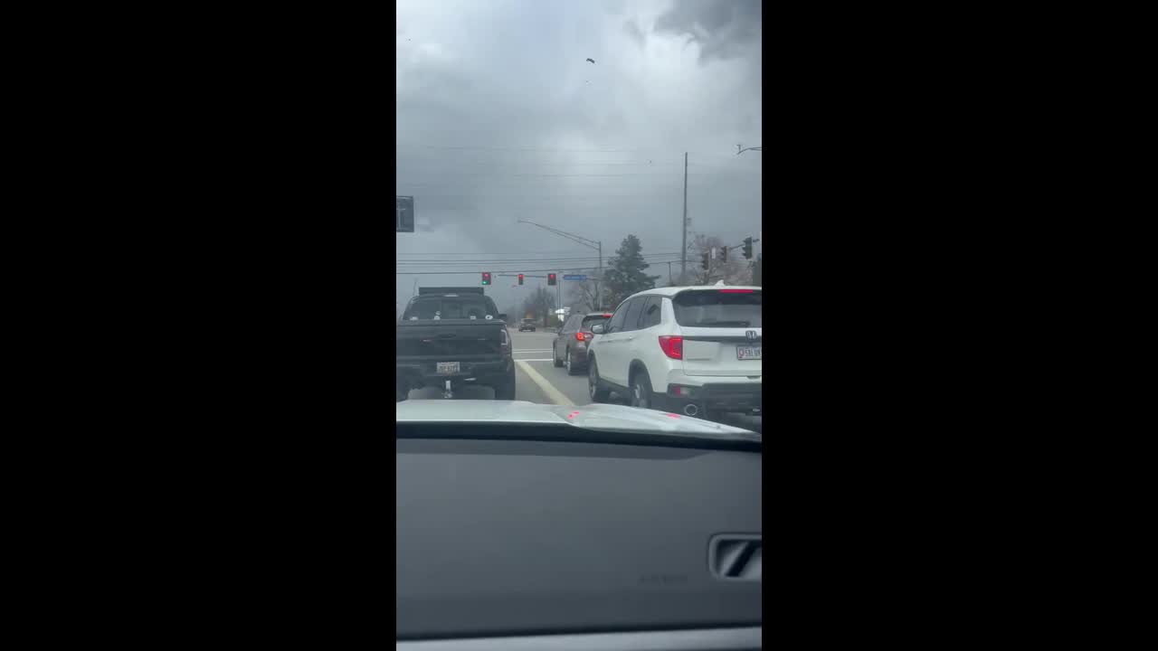 Traffic sign falls during windy weather in Brunswick, Ohio, USA