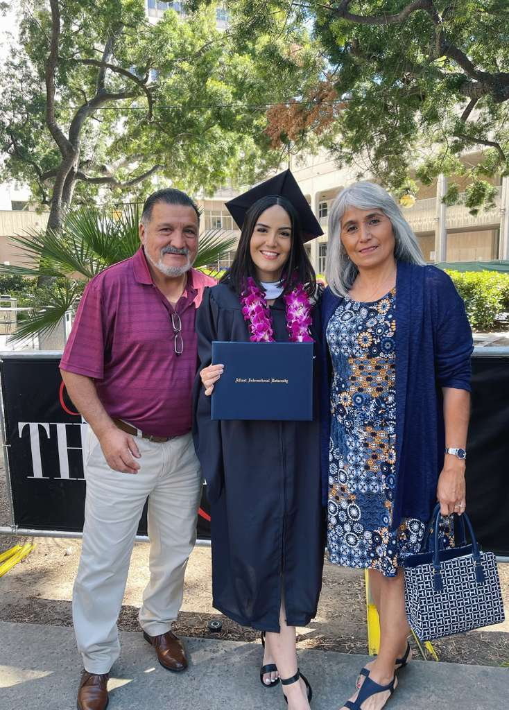 Milena Araya-Davis and her parents. (Pix via Milena Araya-Davis / SWNS)