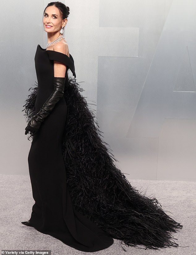Demi Moore, 63, plays up thinner-than-ever frame in black at Vanity Fair  Oscar party