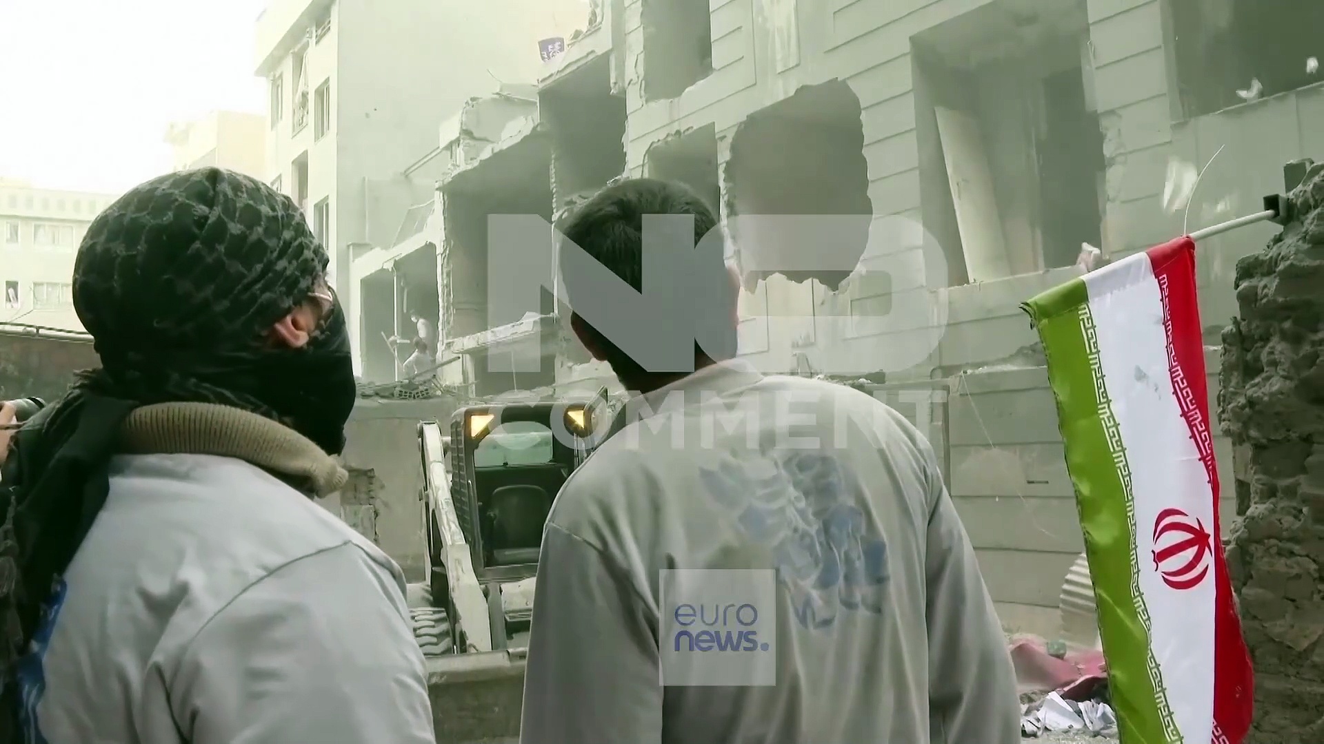Residents clear rubble after strike damages buildings in southern Tehran