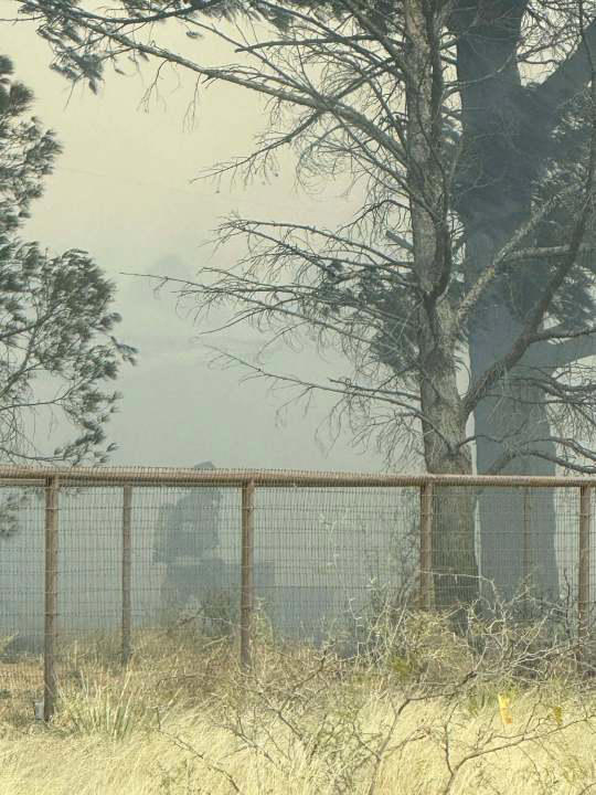 Family displaced after high winds spread fire in Midland County