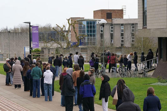 Students queuing for antibiotics at the University of Kent in Canterbury