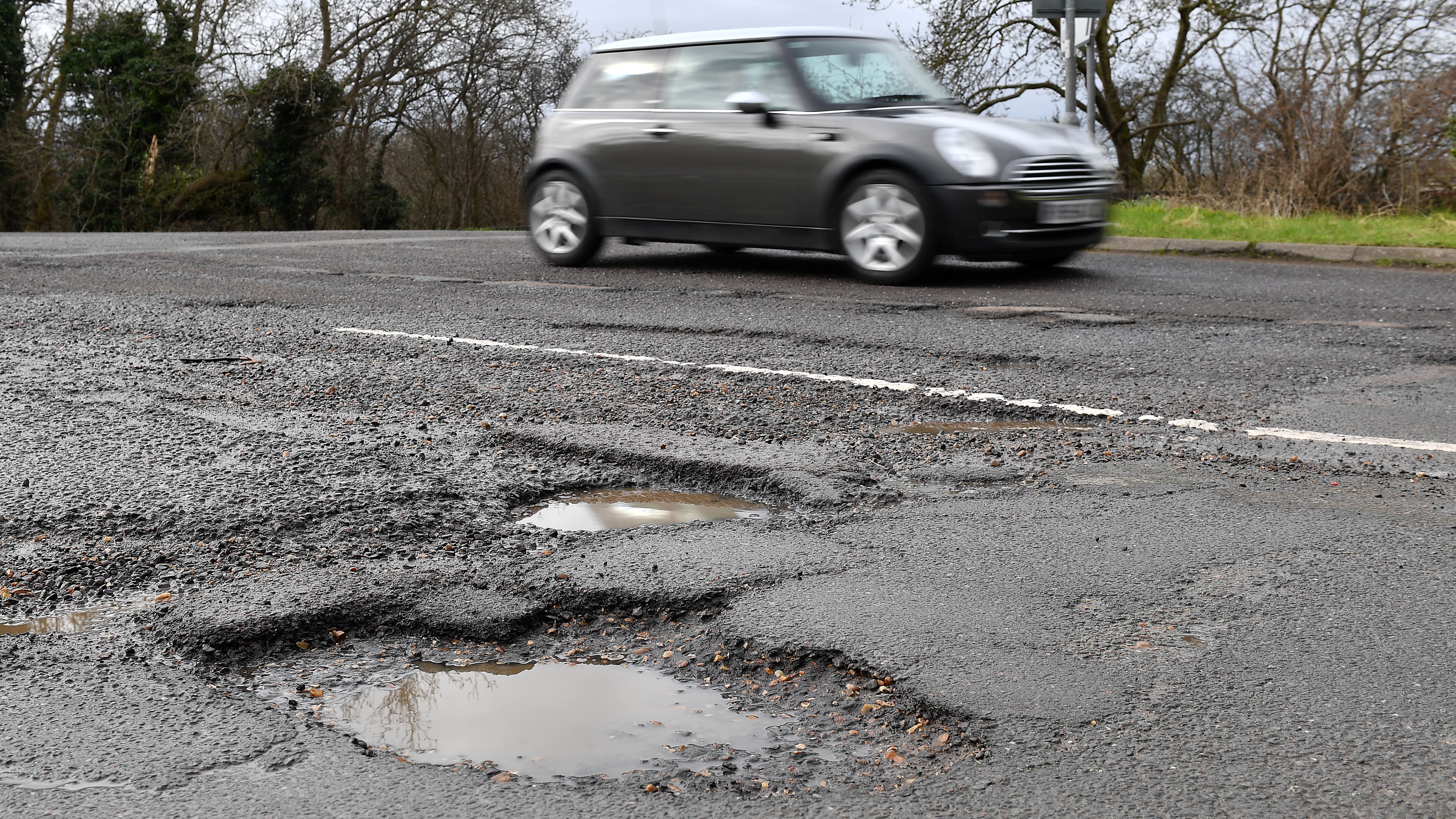 Cost of fixing all potholes on 'national disgrace' roads estimated at £ ...