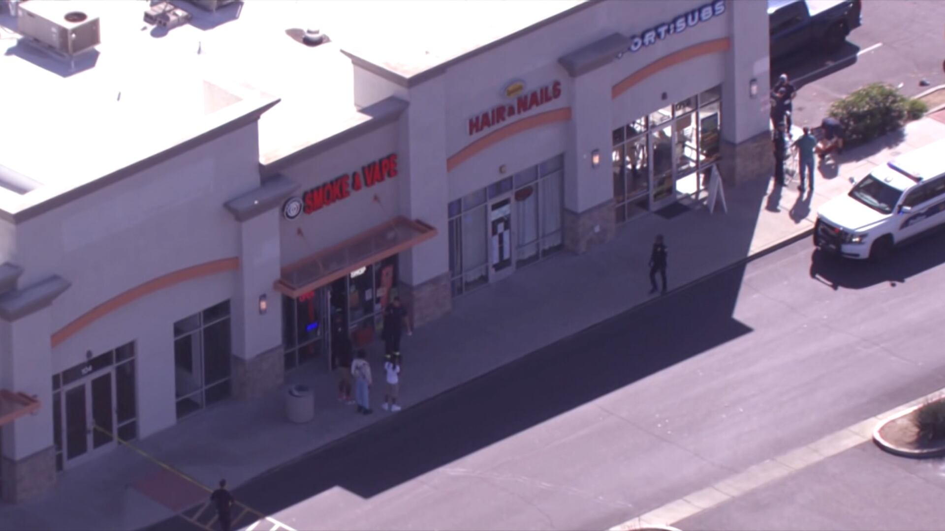 2 men shot outside strip mall in north Phoenix