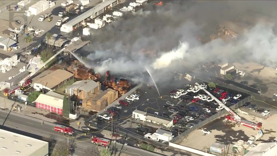 Crews get upper hand on raging 4-alarm pallet yard fire in Riverside