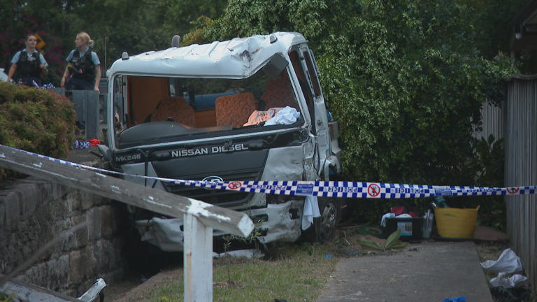 The truck remains stuck on a Belfield Street. 