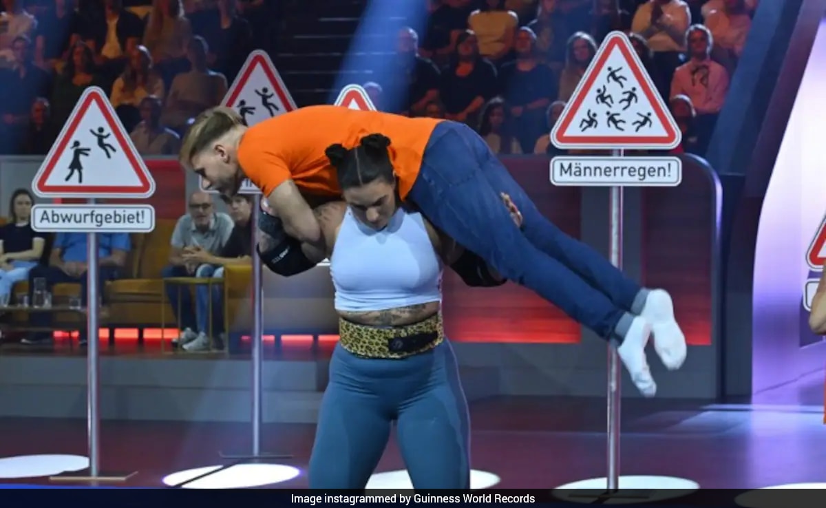 Woman creates Guinness World Record by lifting and throwing 10 men in ...