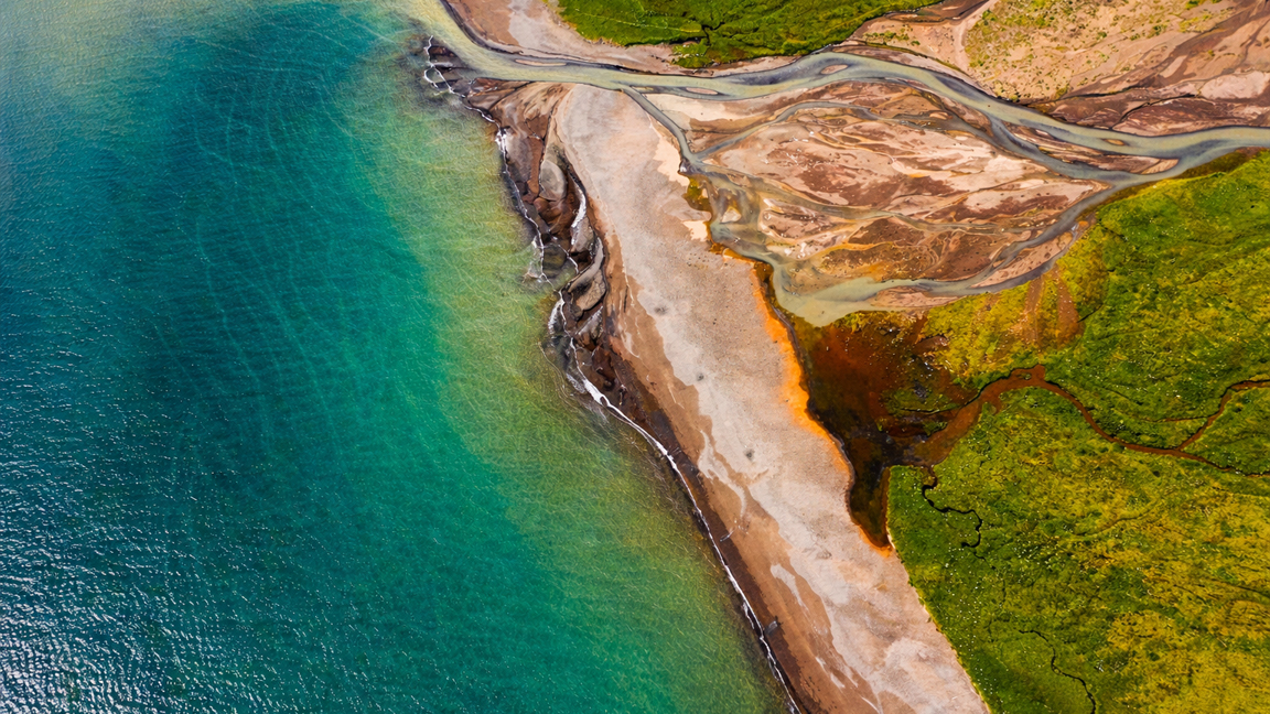 Hidden coastal patterns formed by water and sand