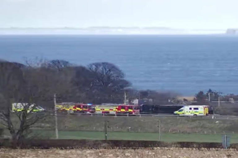 Lorry overturns on A1 in East Lothian as driver cut from cab and two ...