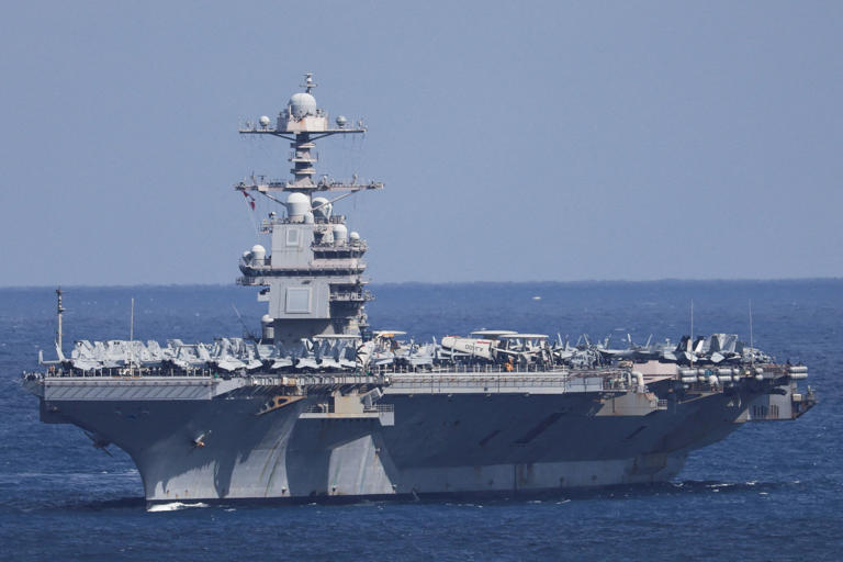 USS Gerald R Ford retreats from Middle East after fire