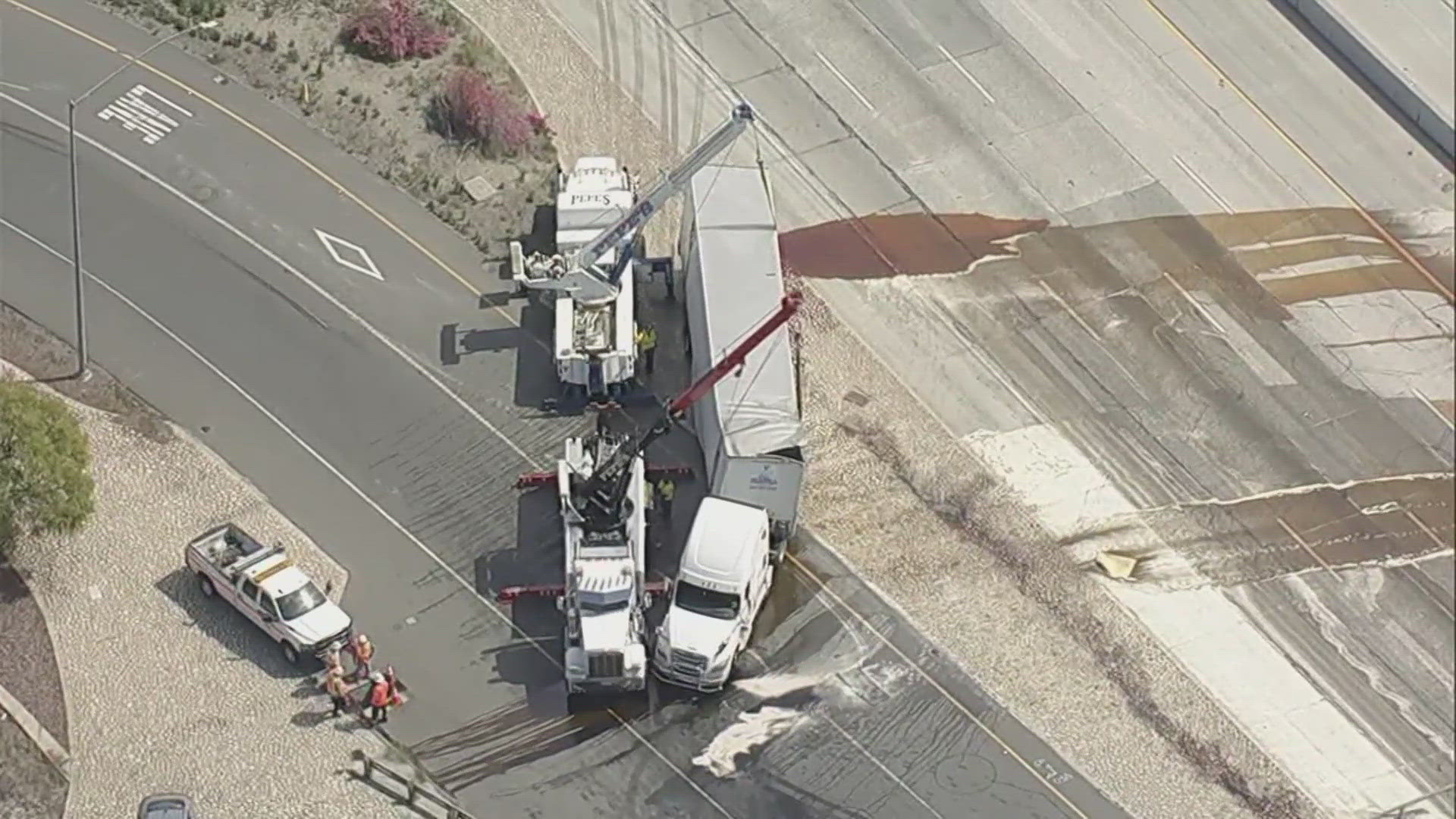 Overturned truck spills syrup, shuts down Southern California freeway