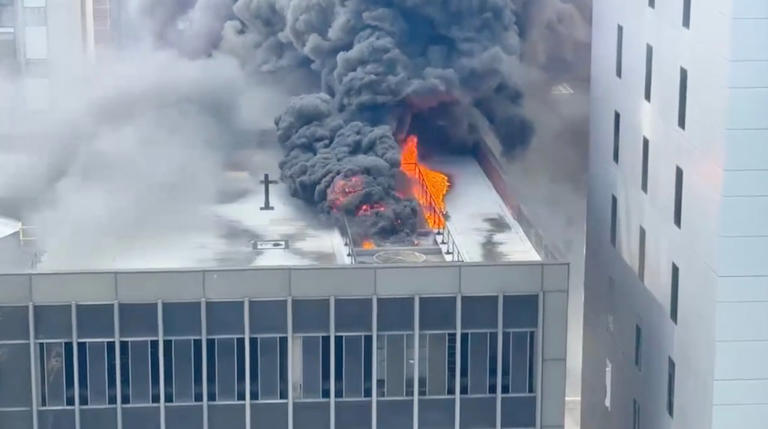 Massive fire burns in NYC Midtown high-rise by start of St. Patrick’s ...